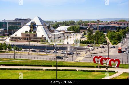 Panorama of Kazan in summer, Tatarstan, Russia. View of Piramida restaurant on Moskovskaya street near Kremlin. Scenery of Kaza Stock Photo