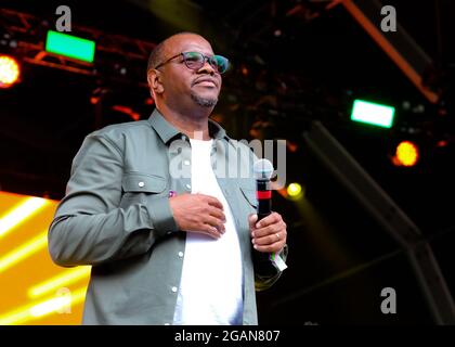 Lulworth, UK. 30th July, 2021. Grammy nominated British Jamaican soul singer Dennis Seaton, lead singer with British pop band Musical Youth performs live on stage during the Camp Bestival festival in Lulworth. (Photo by Dawn Fletcher-Park/SOPA Images/Sipa USA) Credit: Sipa USA/Alamy Live News Stock Photo