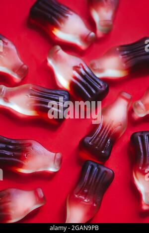 Close up macro jelly gummy candies in bottles shape with cola drink flavour Stock Photo