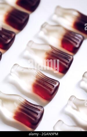 Macro jelly gummy candies in bottle shape with cola drink flavour Stock Photo