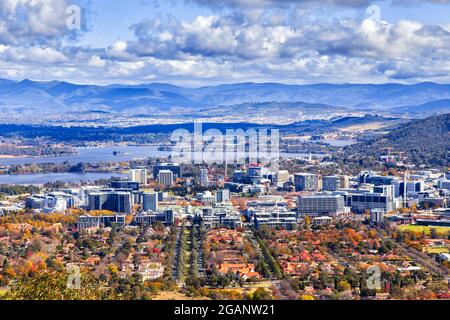 Scenic elevated view of Canberra city CBD on shores of Lake Burley Griffin - sunny day. Stock Photo