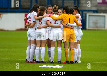 England huddle together before the Women’s Under-19 International Friendly game between England and Czech Republic at New Bucks Head Stadium in Telford. Stock Photo