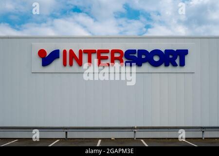 LA FLECHE, FRANCE - Jul 03, 2021: The building facade of INTERSPORT , a famous brand for sport equipment, clothes and accessories in La Fleche, France Stock Photo