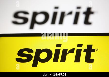 Ukraine. 31st July, 2021. In this photo illustration, Spirit Airlines logo of the US airline seen on a smartphone and a pc screen. (Photo by Pavlo Gonchar/SOPA Images/Sipa USA) Credit: Sipa USA/Alamy Live News Stock Photo