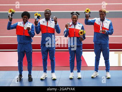 Tokyo, Japan. 01st Aug, 2021. The Dominican Republic 4X400 Mixed Relay team of Anabel Medina Ventura, Marileidy Paulino, Lidio Andres Feliz and Alexander Orando pose on the podium after winning the silver medal at the Athletics competition during the Tokyo Summer Olympics in Tokyo, Japan, on Sunday, August 1, 2021. Photo by Bob Strong/UPI. Credit: UPI/Alamy Live News Stock Photo