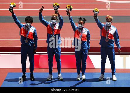 Tokyo, Japan. 01st Aug, 2021. The Dominican Republic 4X400 Mixed Relay team of Anabel Medina Ventura, Marileidy Paulino, Lidio Andres Feliz and Alexander Orando pose on the podium after winning the silver medal at the Athletics competition during the Tokyo Summer Olympics in Tokyo, Japan, on Sunday, August 1, 2021. Photo by Bob Strong/UPI. Credit: UPI/Alamy Live News Stock Photo