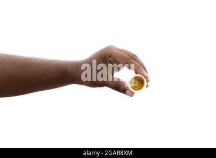 Traditional light holder holding a hand on isolated white background Stock Photo