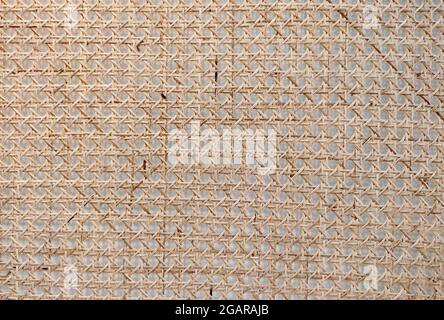 Closeup view of Handcraft woven bamboo strips pattern made in Myanmar. Stock Photo