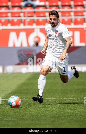 Ingolstadt, Germany. 31st July, 2021. Football: 2. Bundesliga, FC Ingolstadt 04 - 1. FC Heidenheim, Matchday 2 at Audi Sportpark. Marnon Busch from Heidenheim plays the ball. Credit: Matthias Balk/dpa - IMPORTANT NOTE: In accordance with the regulations of the DFL Deutsche Fußball Liga and/or the DFB Deutscher Fußball-Bund, it is prohibited to use or have used photographs taken in the stadium and/or of the match in the form of sequence pictures and/or video-like photo series./dpa/Alamy Live News Stock Photo