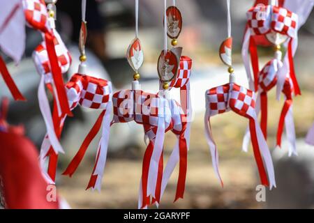 Palu, Indonesia. 01st Aug, 2021. The red and white diamonds are displayed on the side of Moh. Yamin Palu City, Central Sulawesi. The knick-knacks with the colors of the Indonesian flag began to be sold before the birthday of the Republic of Indonesia on August 17th. (Photo by Adi Pranata/Pacific Press) Credit: Pacific Press Media Production Corp./Alamy Live News Stock Photo