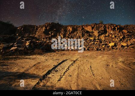 Large deposits of stone materials near a mining quarry Stock Photo