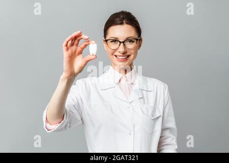 Portrait of a happy doctor dentist. Beautiful female smile. Dentistry concept Stock Photo