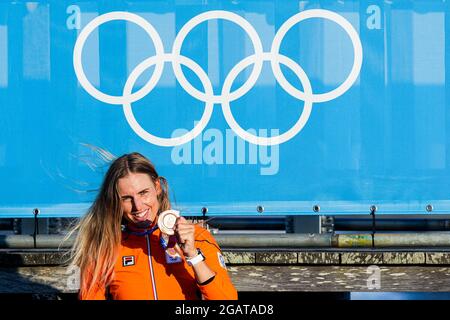 TOKYO, JAPAN - AUGUST 1: Marit Bouwmeester of the Netherlands poses for a photo while she is celebrating her bronze medal during the Medal Ceremony of Sailing during the Tokyo 2020 Olympic Games at the Sagami on August 1, 2021 in Tokyo, Japan (Photo by Ronald Hoogendoorn/Orange Pictures) NOCNSF Stock Photo