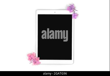 Digital tablet pc creative art mockup and template with floral dried flowers isolated on a white background, copy space Stock Photo