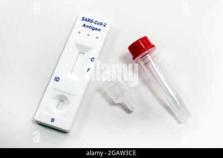 Covid-19 rapid antigen self test for mass detecting of infections in the school, at home and at work, light gray background, high angle view from abov Stock Photo