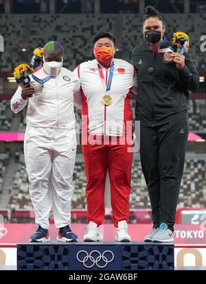 Tokyo, Japan. 1st Aug, 2021. Gold medalist Gong Lijiao (C) of China, silver medalist Raven Saunders (L) of the United States and bronze medalist Valerie Adams of New Zealand react during the awarding ceremony of the Women's Shot Put at the Tokyo 2020 Olympic Games in Tokyo, Japan, Aug. 1, 2021. Credit: Ju Huanzong/Xinhua/Alamy Live News Stock Photo