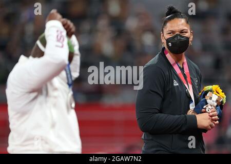 Tokyo, Japan. 1st Aug, 2021. Silver medalist Raven Saunders (L) of the United States and bronze medalist Valerie Adams of New Zealand react during the awarding ceremony of the Women's Shot Put at the Tokyo 2020 Olympic Games in Tokyo, Japan, Aug. 1, 2021. Credit: Li Ming/Xinhua/Alamy Live News Stock Photo