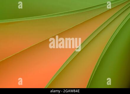 Sheets of paper illuminated by two flashguns with coloured gels in the front to add colour to them Stock Photo