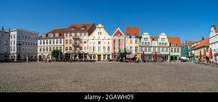 Panoramic view on Marktplatz (Market Square) in old town. University and Hanseatic City of Greifswald is a city in the state of Mecklenburg-Vorpommern Stock Photo