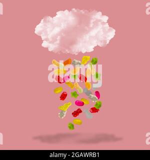Gummy candies falling from a fluffy cloud Stock Photo