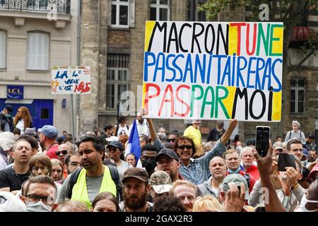 Paris, France. 31th July, 2021. Demonstration against the health pass and the government bill on Saturday July 31, 2021 in Paris, France. Stock Photo