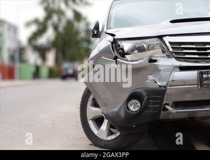 Damaged car after an accident. Damaged vehicle. Stock Photo