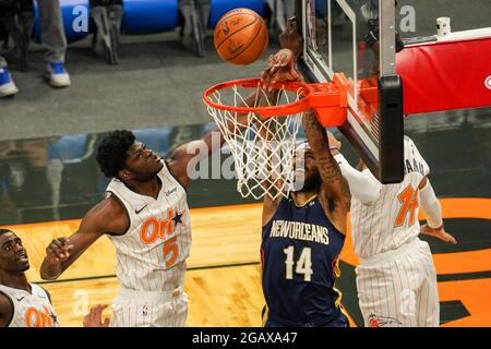 Orlando, Florida, USA, February 19, 2021, New Orleans Pelicans Small Forward Brandon Ingram #14 attempt to make a dunk against the Orlando Magic at the Amway Center  (Photo Credit:  Marty Jean-Louis) Stock Photo