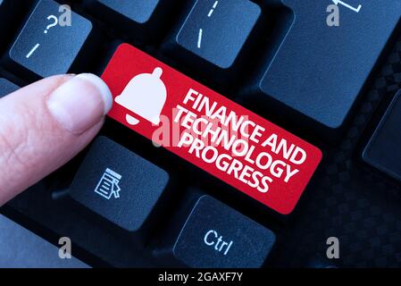 Hand writing sign Finance And Technology Progress. Business overview helps develop innovative financial services Creating New Typing Game Concept Stock Photo