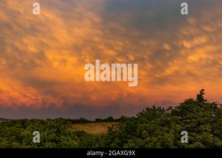 Sunset mammatus clouds after a storm. Serbia. Stock Photo