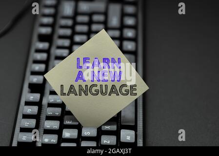 Sign displaying Learn A New Language. Business idea ability to communicate in the second orforeign language Copying Old Ideas And Creating New Ones Stock Photo