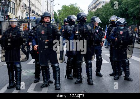 Paris, France. 01st Aug, 2021. Several thousand people gathered to demonstrate against the health pass (Pass Sanitaire). There were clashes with the police. Paris, France, on July 31, 2021. Photo by Kelly Linsale /BePress/ABACAPRESS.COM Credit: Abaca Press/Alamy Live News Stock Photo