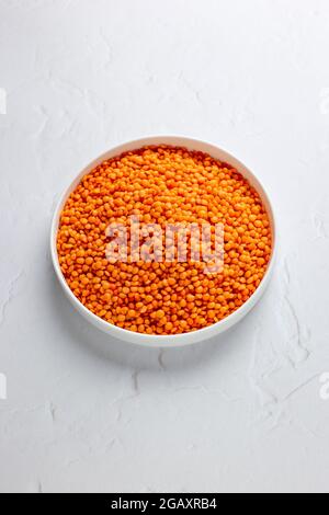 Red Lentils in White Dish on a White Background, Isolated – FOODPIX WHITE - COPYSPACE - ROOM FOR TEXT Stock Photo