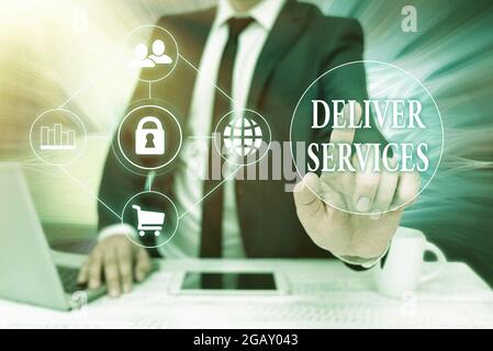 Text caption presenting Deliver Services. Business showcase sending any kind of assistance or products to an area Bussiness Man Sitting Desk Laptop Stock Photo