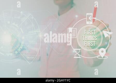 Conceptual caption First Things First. Business overview Business, technology, internet, set your priorities and most important Woman In Uniform Stock Photo