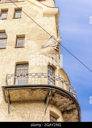 Eagle sculpture above the bay window and balcony on the building designed by Architect Pretro, Northern modern style, St Petersburg, Russia Stock Photo