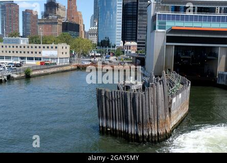 View from the Staten Island Ferry pulling into Whitehall Terminal in New York City Stock Photo