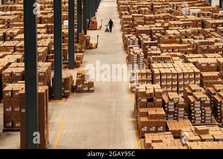 Warehouse, package shipment, freight transportation and delivery concept, cardboard boxes on pallet. Stock Photo