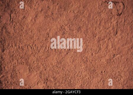 Terracotta colored  wall grunge background or texture Stock Photo