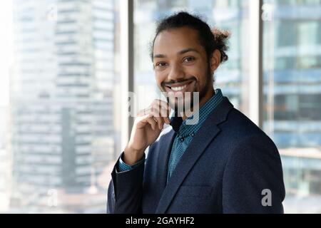 Portrait of confident smiling young african american business man. Stock Photo