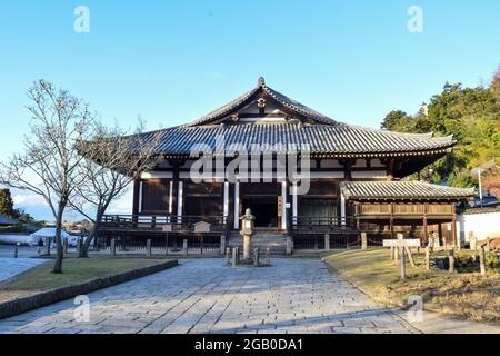 Nara, Japan - December 15, 2016: View of the worship hall Todaiji Hokkedo or Sangatsudo Buddhist temple in Nara, Japan. Stock Photo