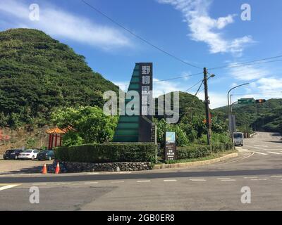 New Taipei, Taiwan - July 6, 2015: View of the entrance gate to Yehliu Geopark Park in the northern coast of Taiwan. Stock Photo