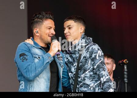 Peter Andre with son Junior Andre performing on stage at the Fantasia music concert in Maldon, Essex, UK soon after lifting of COVID restrictions Stock Photo