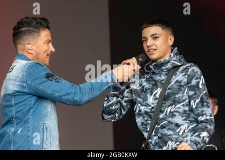 Peter Andre with son Junior Andre performing on stage at the Fantasia music concert in Maldon, Essex, UK soon after lifting of COVID restrictions Stock Photo