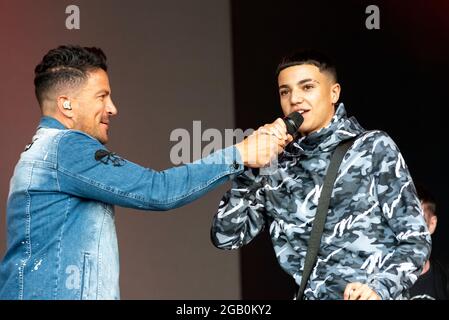 Peter Andre with son Junior Andre performing on stage at the Fantasia music concert in Maldon, Essex, UK soon after lifting of COVID restrictions Stock Photo