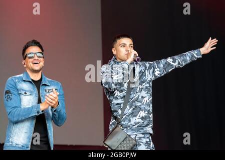 Peter Andre with son Junior Andre performing on stage at the Fantasia music concert in Maldon, Essex, UK soon after lifting of COVID restrictions Stock Photo