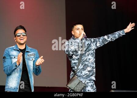 Peter Andre with son Junior Andre performing on stage at the Fantasia music concert in Maldon, Essex, UK soon after lifting of COVID restrictions Stock Photo