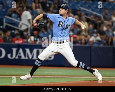 St. Petersburg, FL USA; Minnesota Twins catcher Christian Vazquez (8) hits  a line drive to Tampa Bay Rays right fielder Josh Lowe (15) during an MLB g  Stock Photo - Alamy