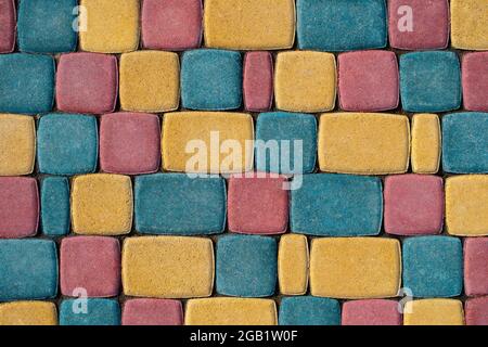 Colorful tile of bricks on the sidewalk. Stone texture background. Stock Photo