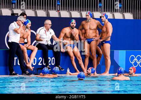 TOKYO, JAPAN - AUGUST 2: Amedeo Pomilio of Italy, Alessandro Duspiva of Italy, Niccolo Figari of Italy, Head Coach Allessandro Campagna of Italy, Francesco di Fulvio of Italy, Pietro Figlioli of Italy, Allessandro Velotto of Italy, (front row L-R) Vincenzo Renzuto of Italy, Vincenzo Dolce of Italy, Matteo Aicardi of Italy, Nicholas Presciutti of Italy, Stefano Luongo of Italy, Marco del Lungo of Italy during the Tokyo 2020 Olympic Waterpolo Tournament Men match between Team Hungary and Team Italy at Tatsumi Waterpolo Centre on August 2, 2021 in Tokyo, Japan (Photo by Marcel ter Bals/Orange Pic Stock Photo