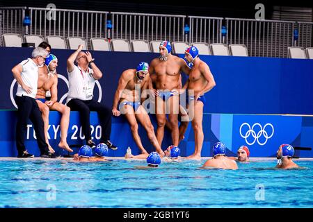 TOKYO, JAPAN - AUGUST 2: Amedeo Pomilio of Italy, Alessandro Duspiva of Italy, Niccolo Figari of Italy, Head Coach Allessandro Campagna of Italy, Francesco di Fulvio of Italy, Pietro Figlioli of Italy, Allessandro Velotto of Italy, (front row L-R) Vincenzo Renzuto of Italy, Vincenzo Dolce of Italy, Matteo Aicardi of Italy, Nicholas Presciutti of Italy, Stefano Luongo of Italy, Marco del Lungo of Italy during the Tokyo 2020 Olympic Waterpolo Tournament Men match between Team Hungary and Team Italy at Tatsumi Waterpolo Centre on August 2, 2021 in Tokyo, Japan (Photo by Marcel ter Bals/Orange Pic Stock Photo